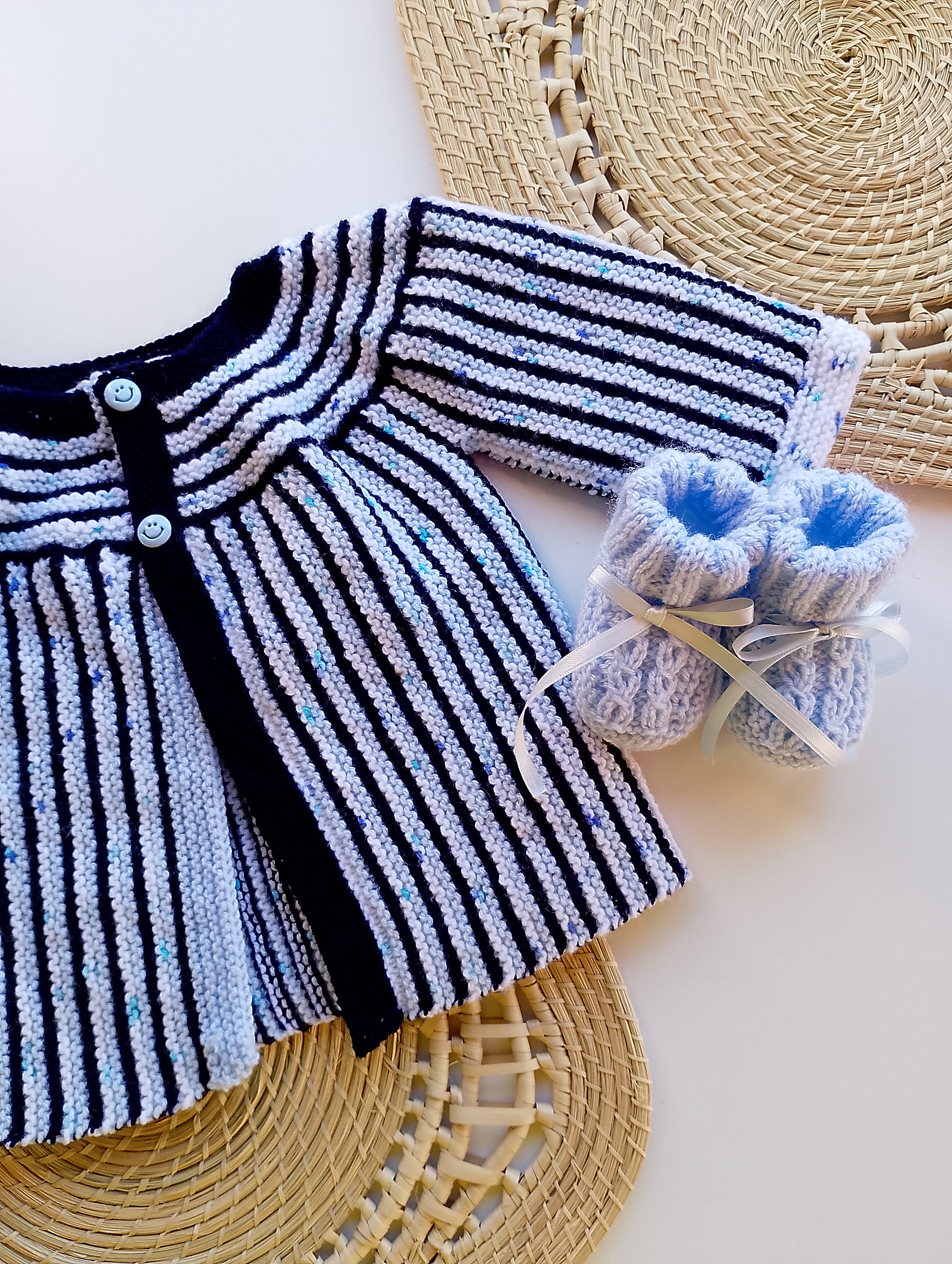 Saco bebé azul y blanco